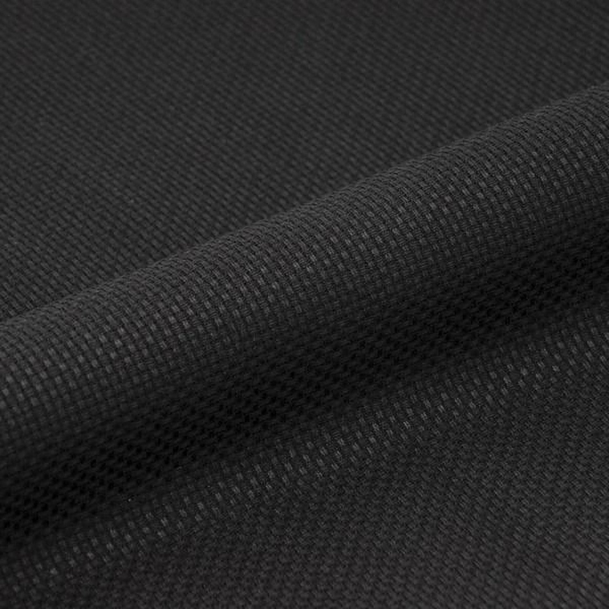 A close-up view of a black fabric with a textured, woven pattern.