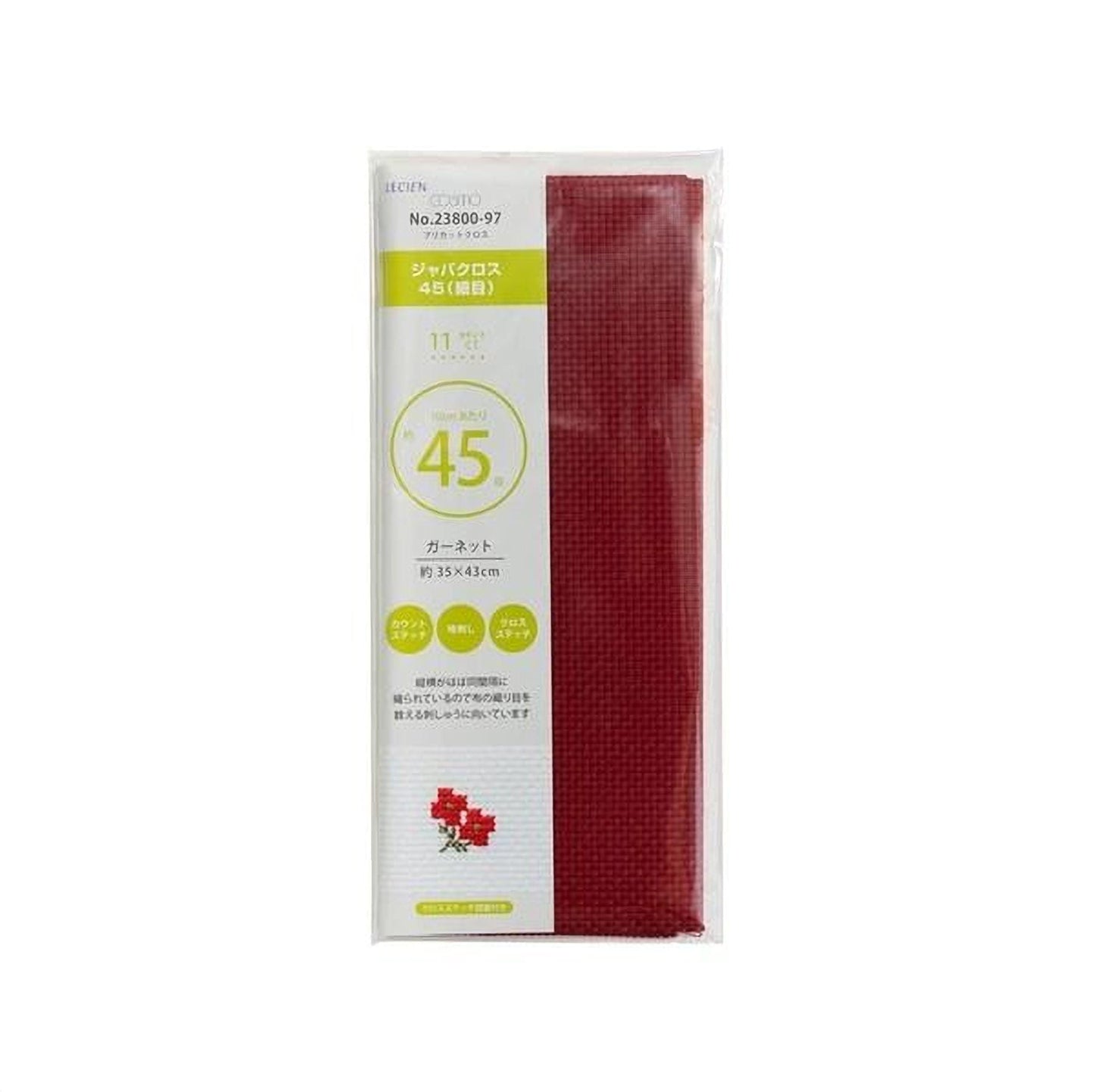 a package of red fabric, likely a piece of clothing or textile, with a green and white label.