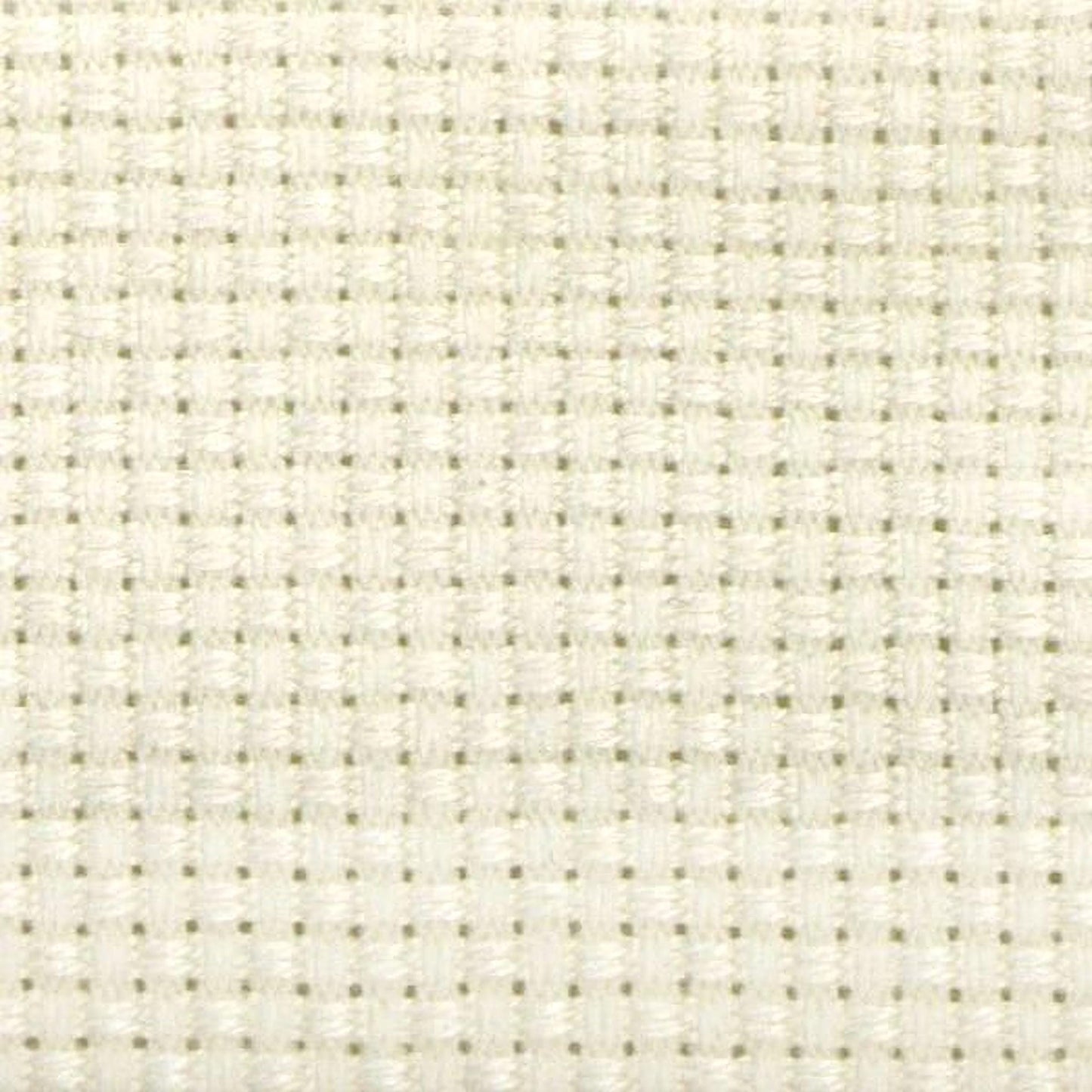 The image is a close-up of a white fabric with a grid-like pattern, composed of small squares or rectangles.