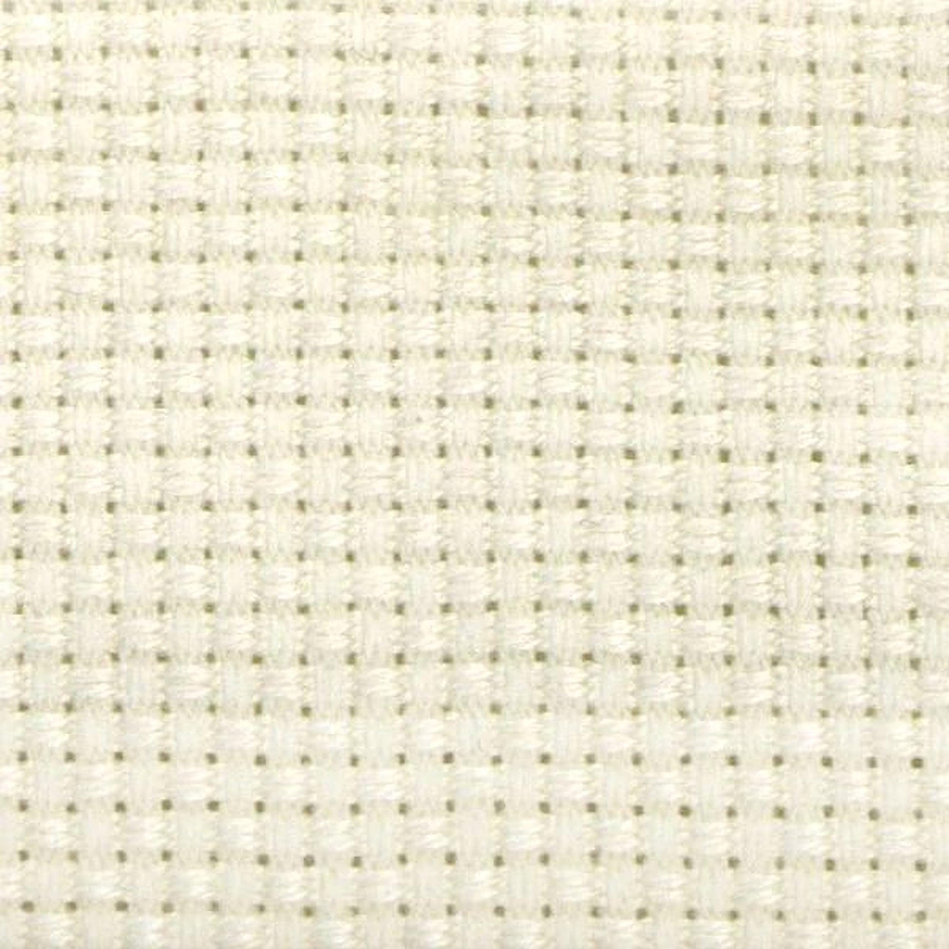 The image is a close-up of a white fabric with a grid-like pattern, composed of small squares or rectangles.
