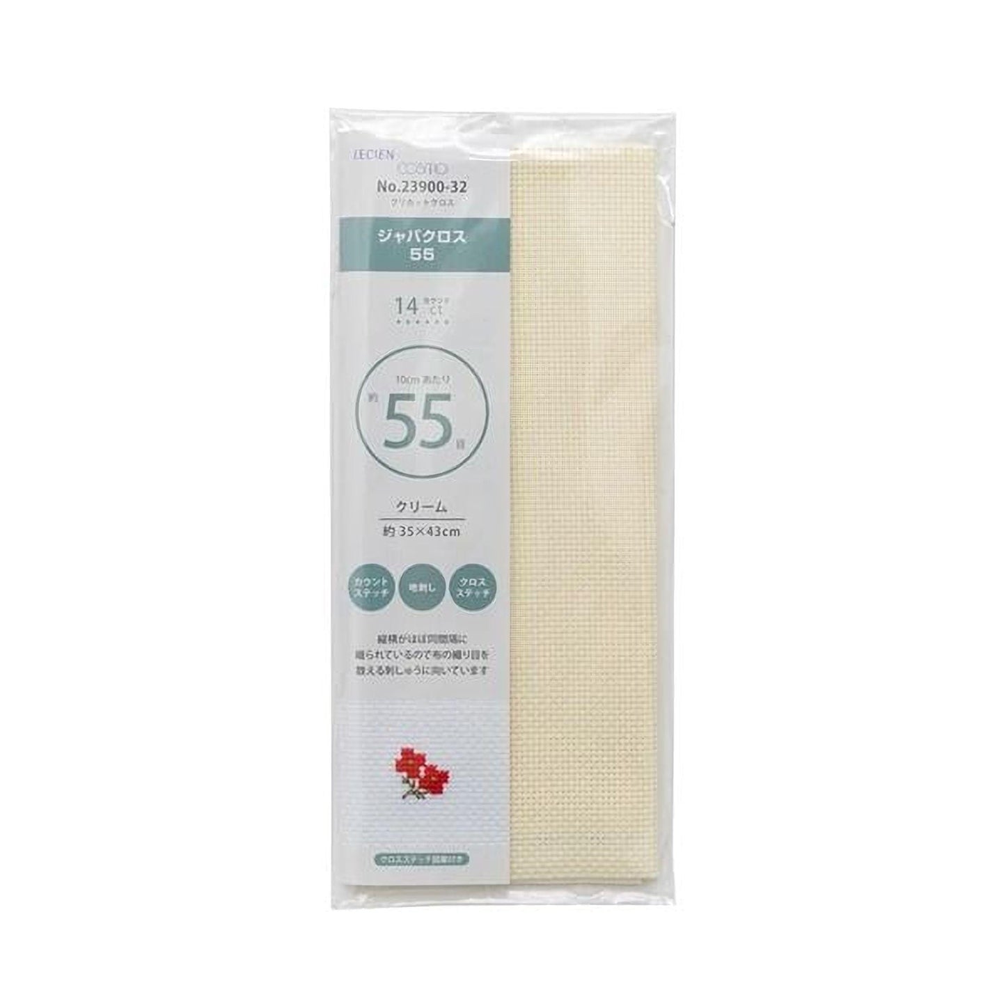 a package of a product, likely a cross-stitch kit, with a white and beige color scheme. The package has text and a small image of a flower on the bottom left corner.