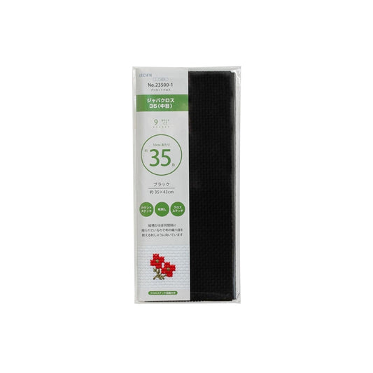 a black mesh bag with a green label, which appears to be a product packaging.