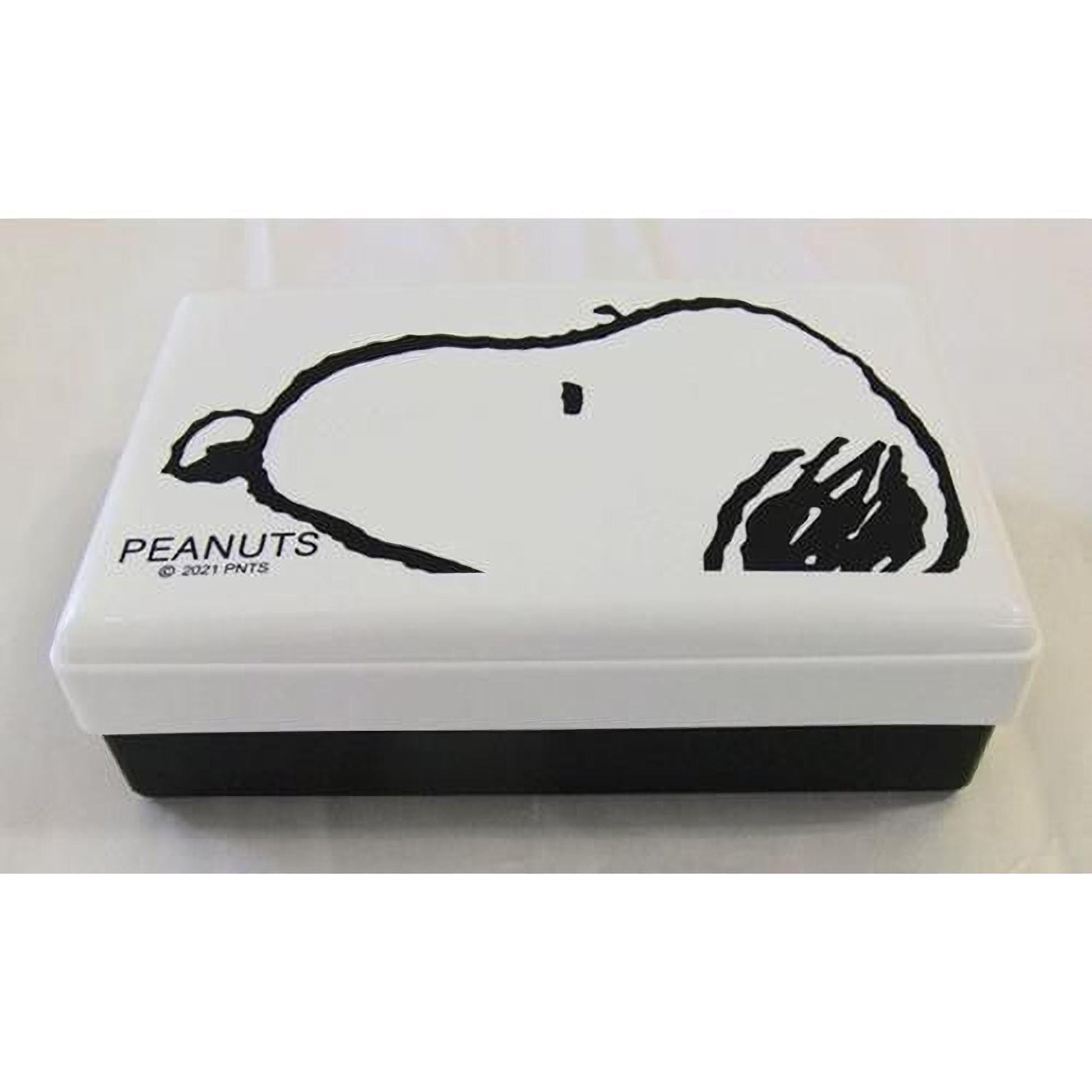 A white box with a black Peanuts logo on it.