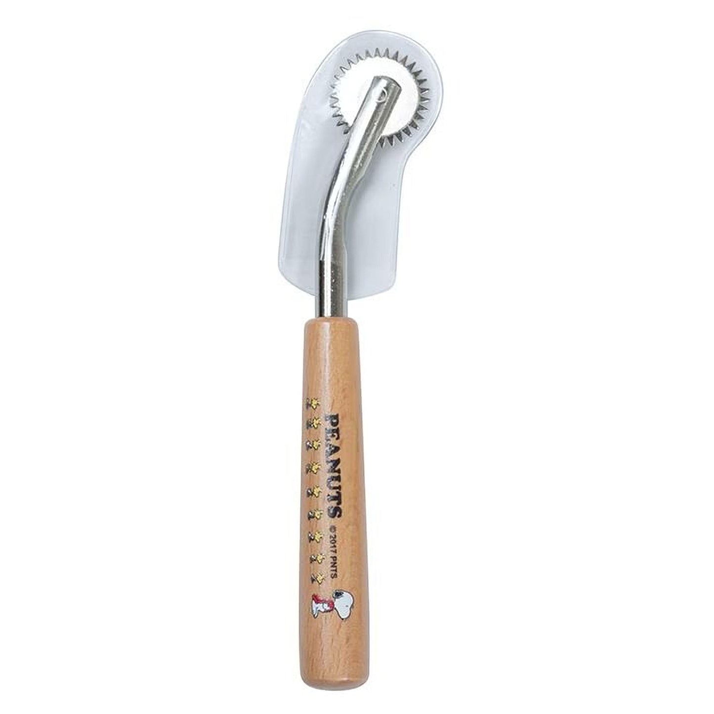 A wooden rolling pin with a metal blade and a handle, featuring a Peanuts logo and a cartoon character.