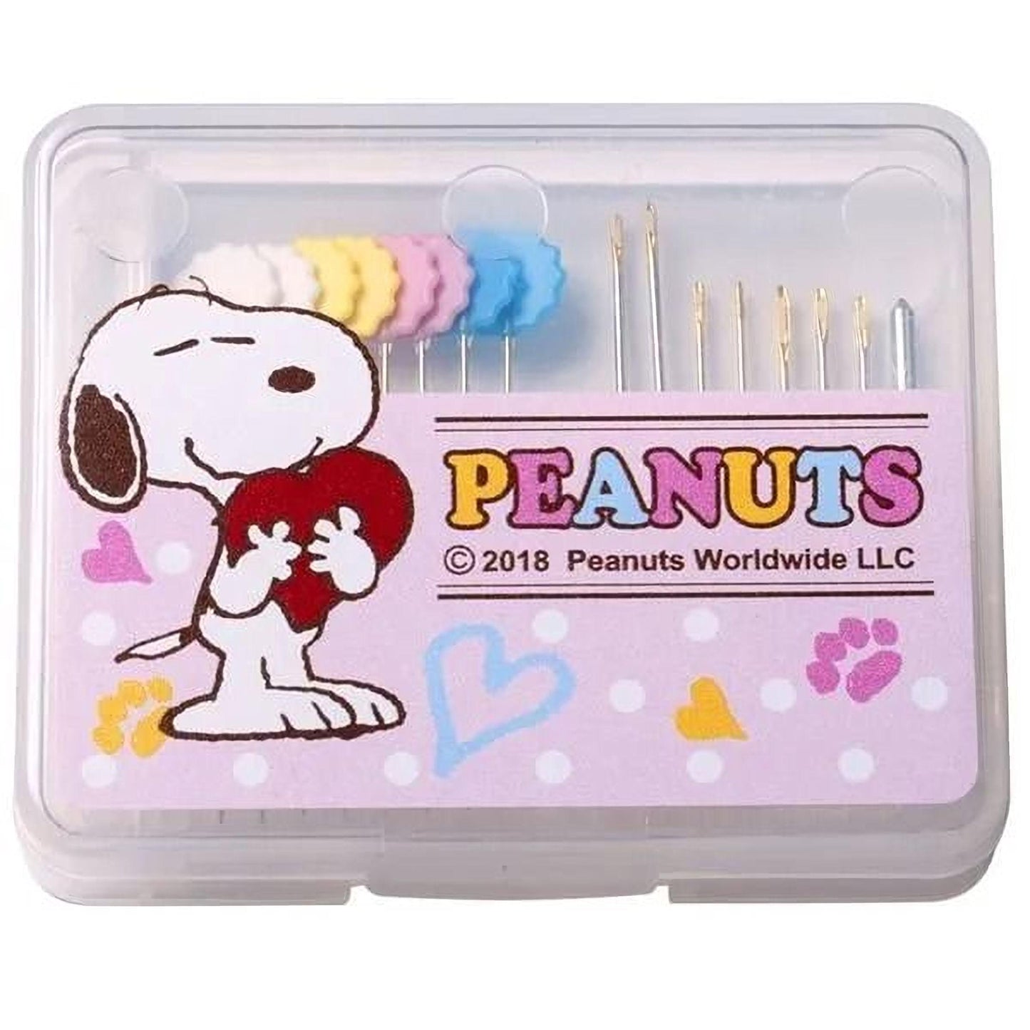 A clear plastic container with a cartoon image of a dog holding a heart and the text "Peanuts" and "© 2018 Peanuts Worldwide LLC" printed on it.