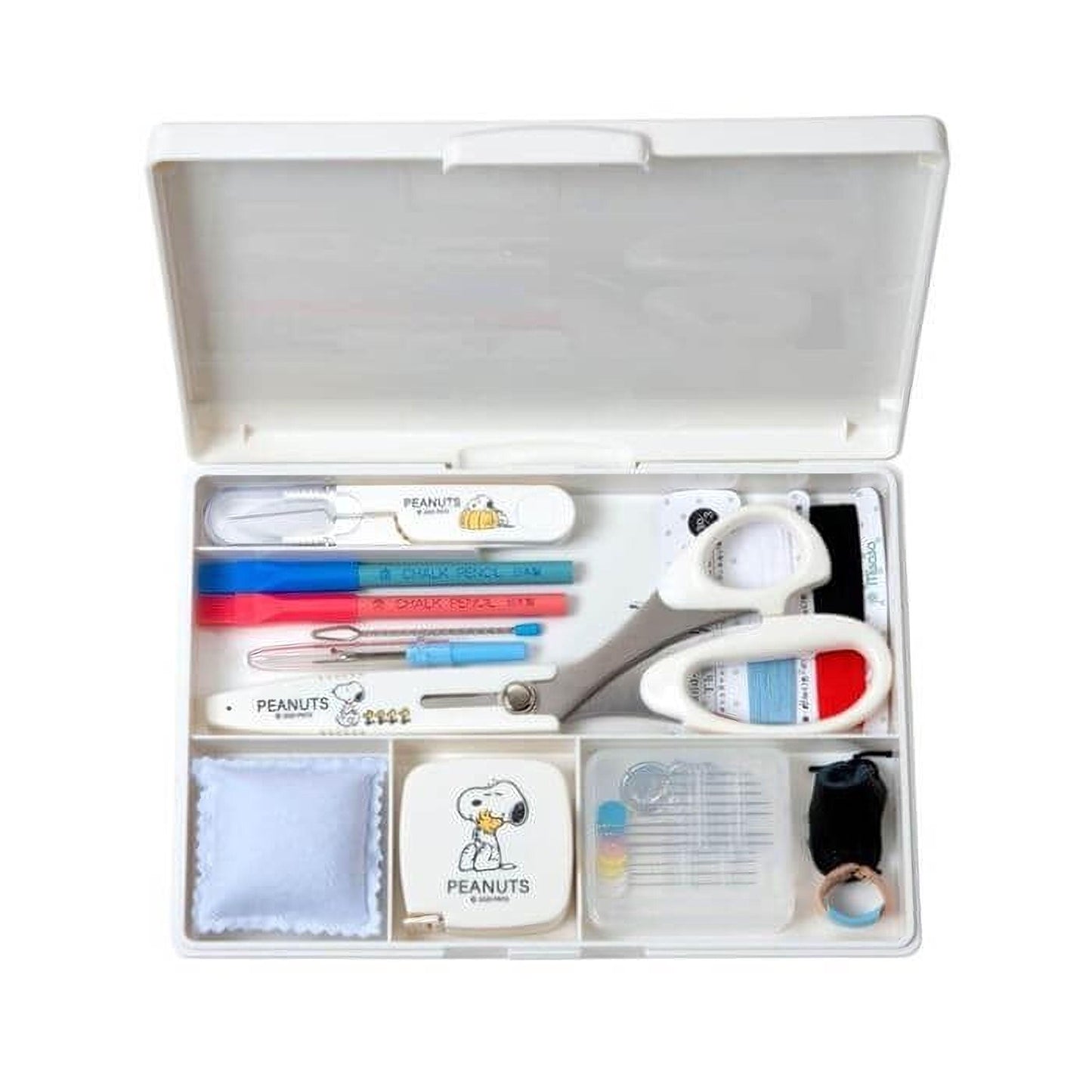 A white plastic organizer with compartments containing various office and personal items, including a pencil case, scissors, and other tools.