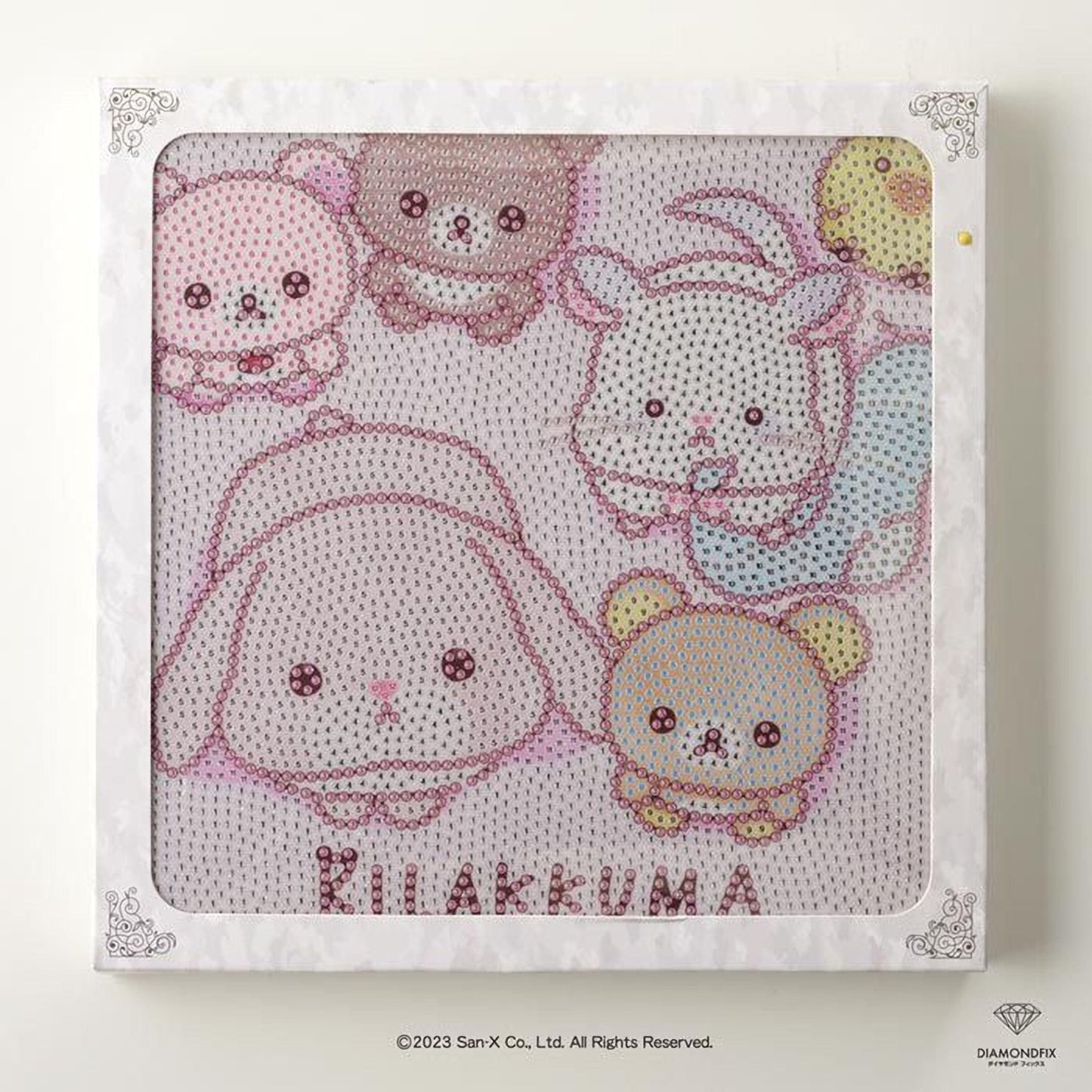 The image is a framed artwork featuring a variety of cute, cartoon-like animal characters, including a pink bunny, a white cat, and other small animals. The text "KILAKKUMA" is prominently displayed in the center of the frame.