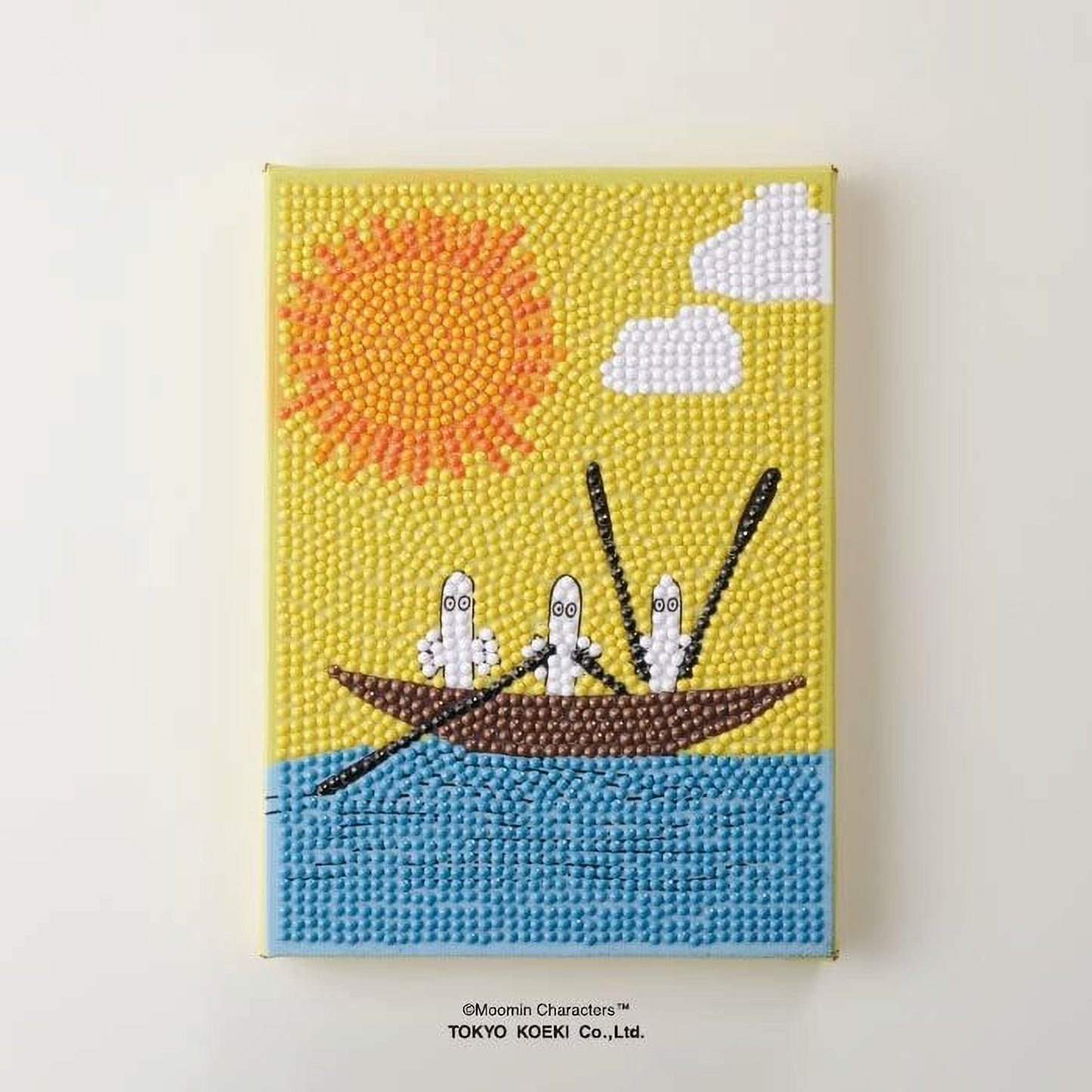 The image is a vibrant, hand-painted canvas depicting a boat with two ghostly figures rowing on a blue body of water, set against a yellow and orange background with a sun and clouds.