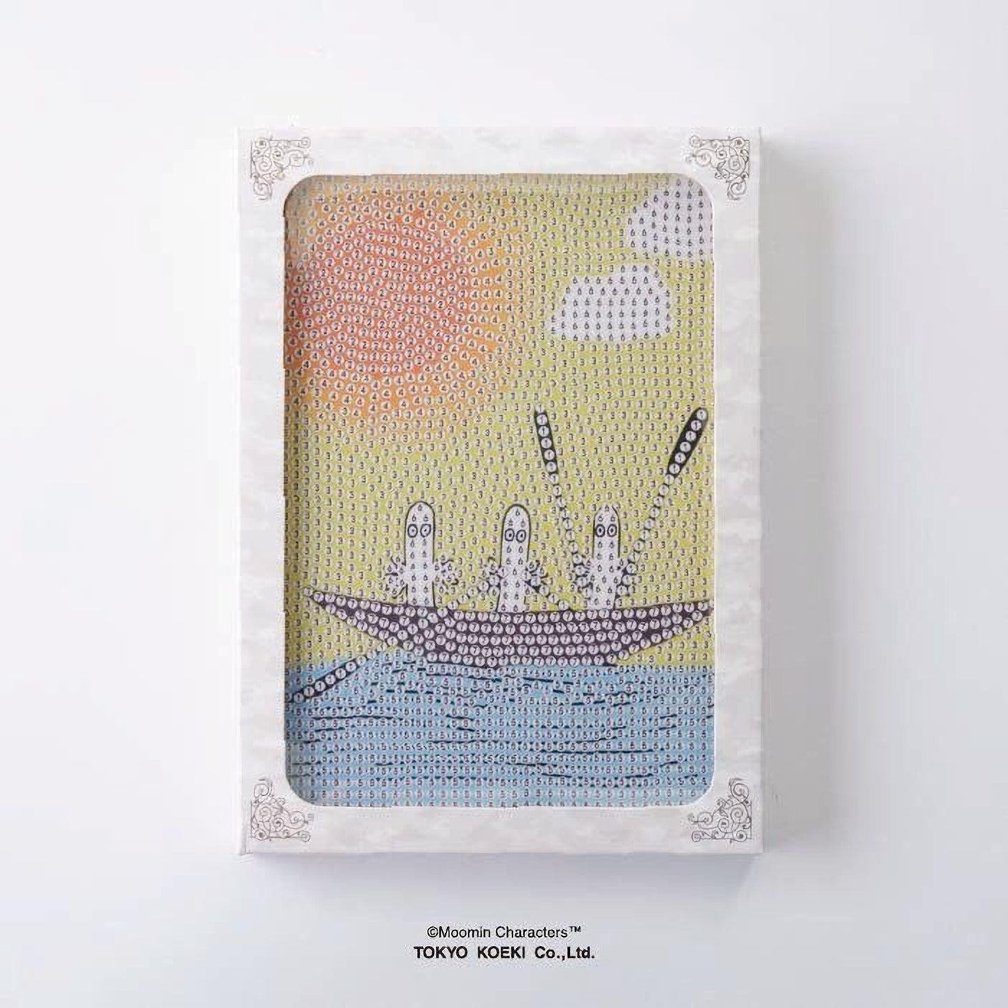 The image is a framed artwork depicting a boat with three small figures on it, set against a background of a sun and clouds.
