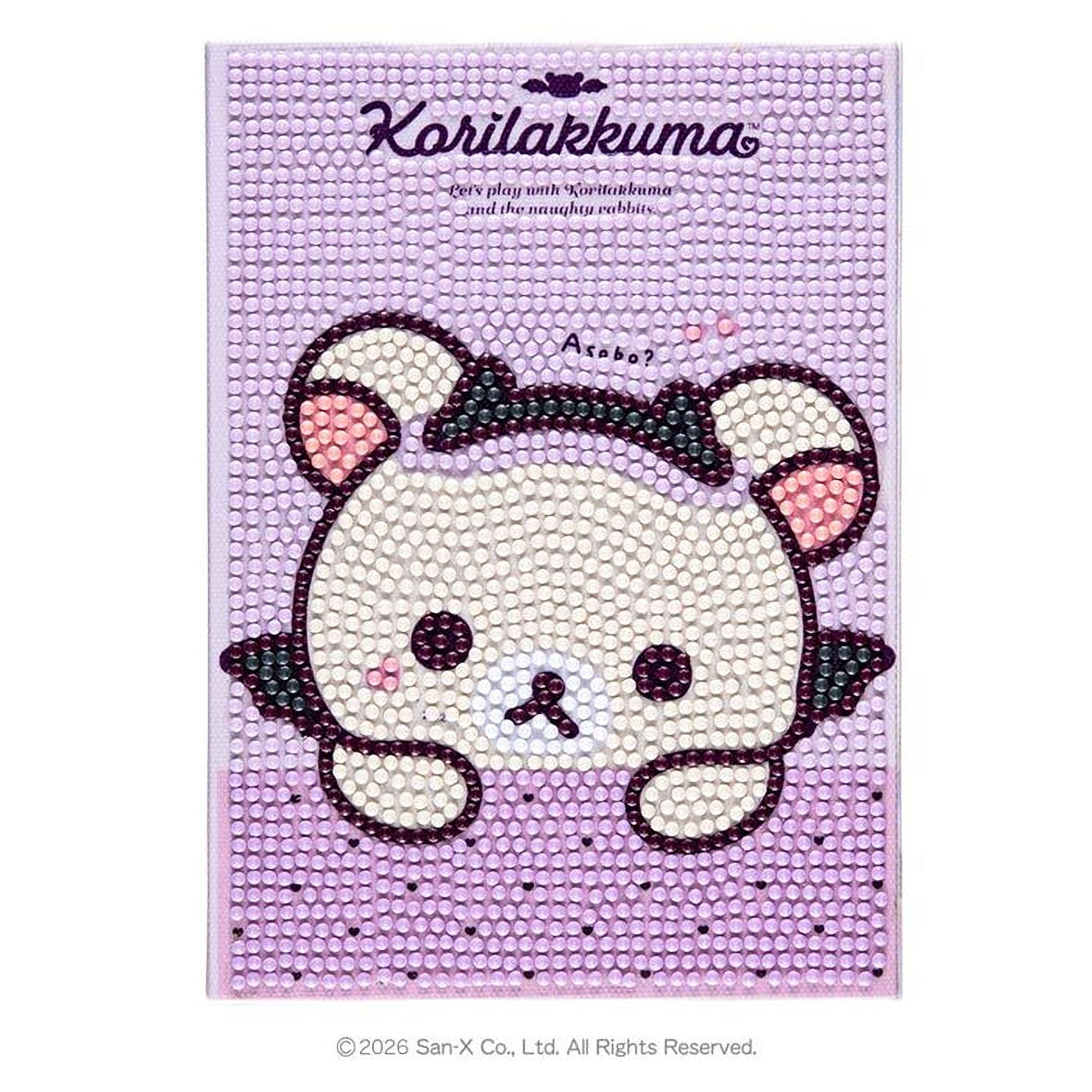 A purple background with a cartoon-like bear design made of small, colorful beads.