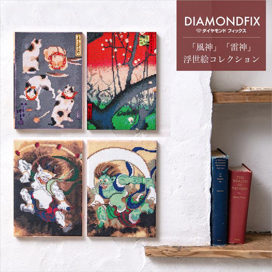 The image is a collage of four framed artworks, each depicting different scenes or characters, displayed on a wall next to a shelf with books.