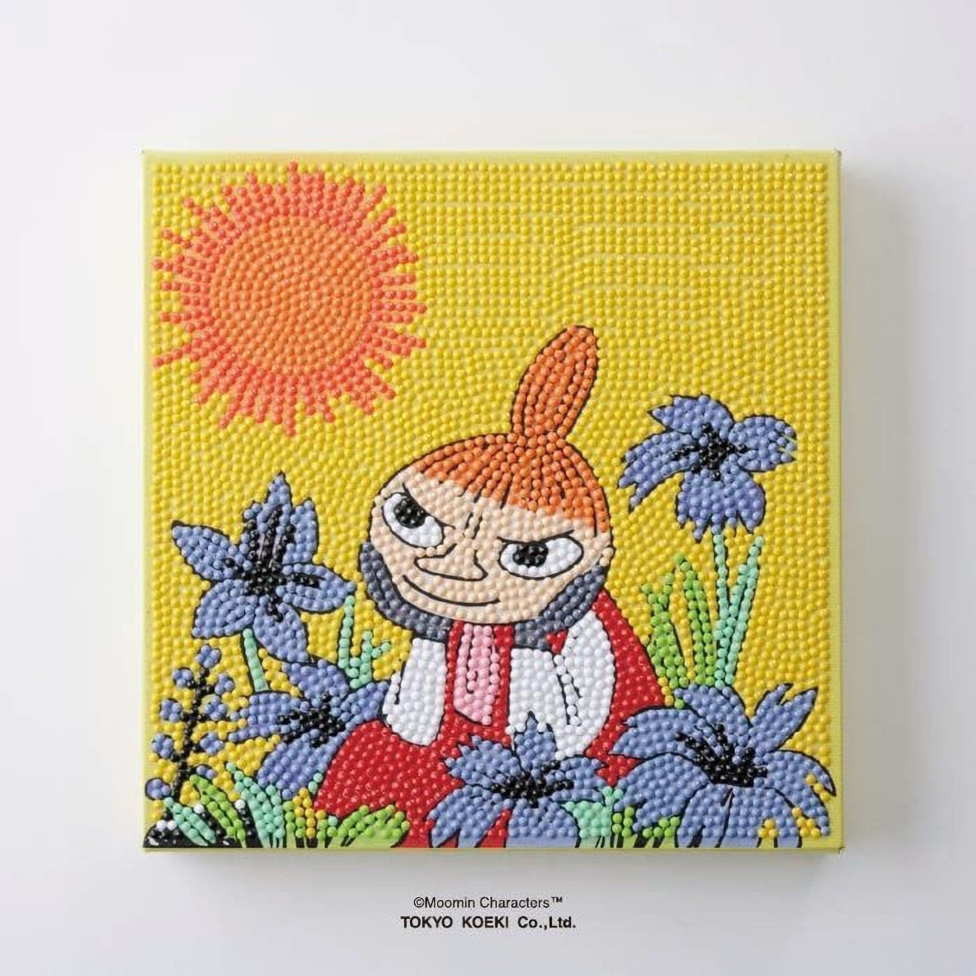 The image is a vibrant, hand-painted mosaic featuring a cartoon character surrounded by flowers and a sun.
