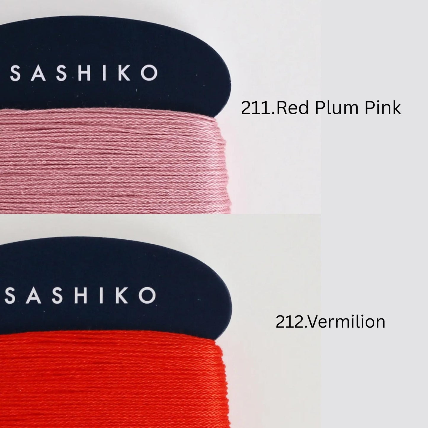 two spools of thread, one in a dark blue color labeled "SASHIKO" and the other in a lighter pink color labeled "211.Red Plum Pink".