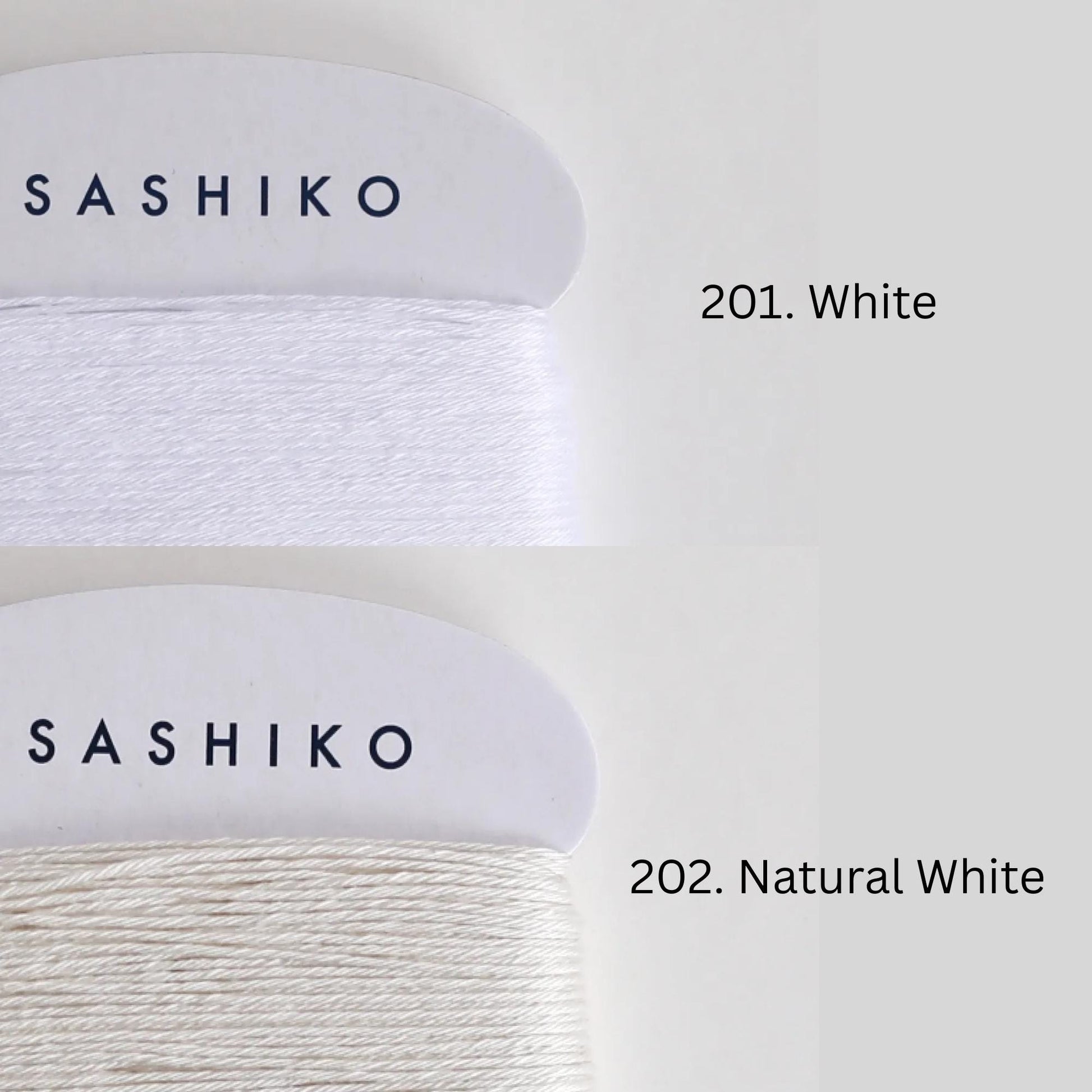 two spools of yarn, each with a different color: one labeled "SASHIKO" in black text on a white background, and the other labeled "201. Natural White" in black text on a white background.