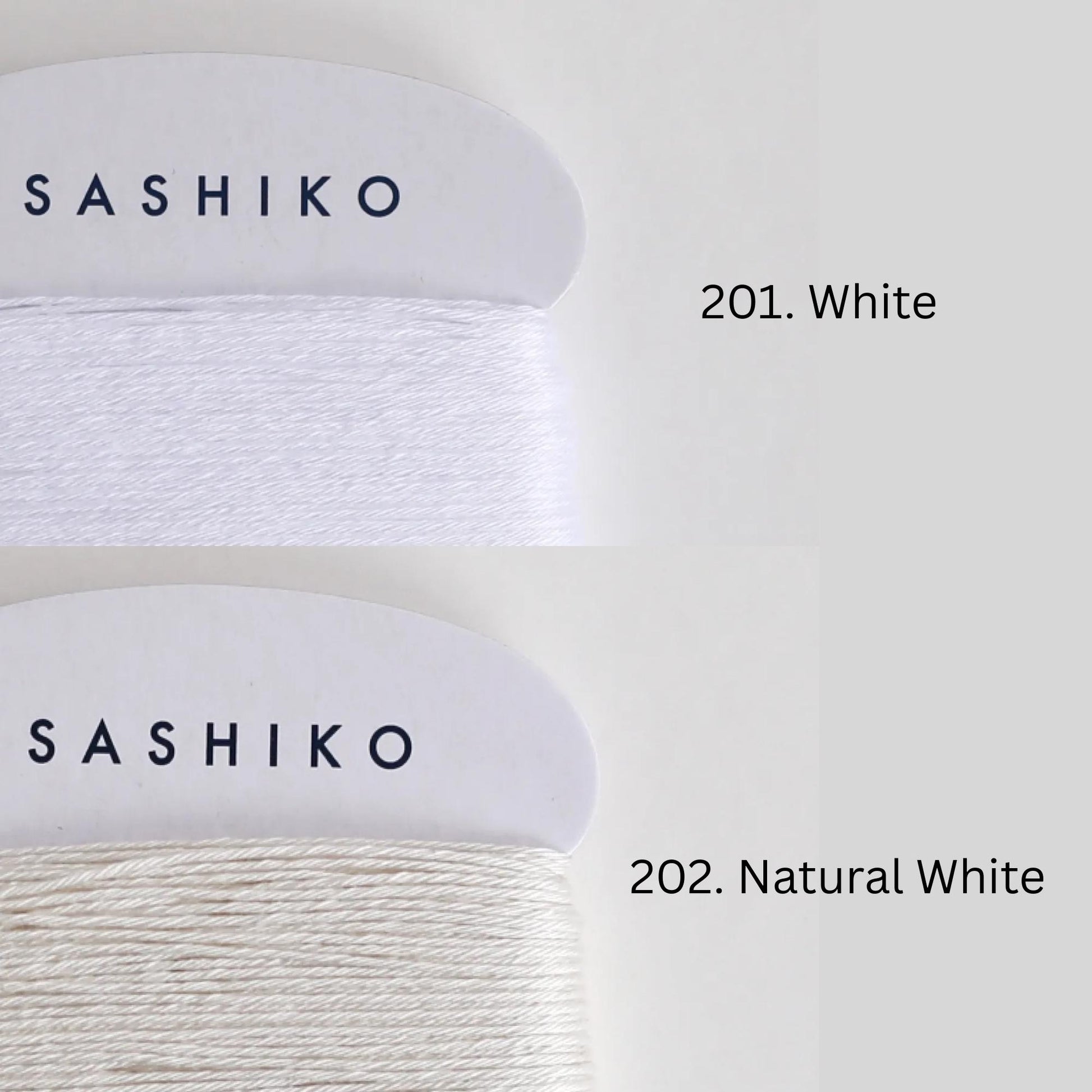 two spools of yarn, each with a different color: one labeled "SASHIKO" in black text on a white background, and the other labeled "201. Natural White" in black text on a white background.