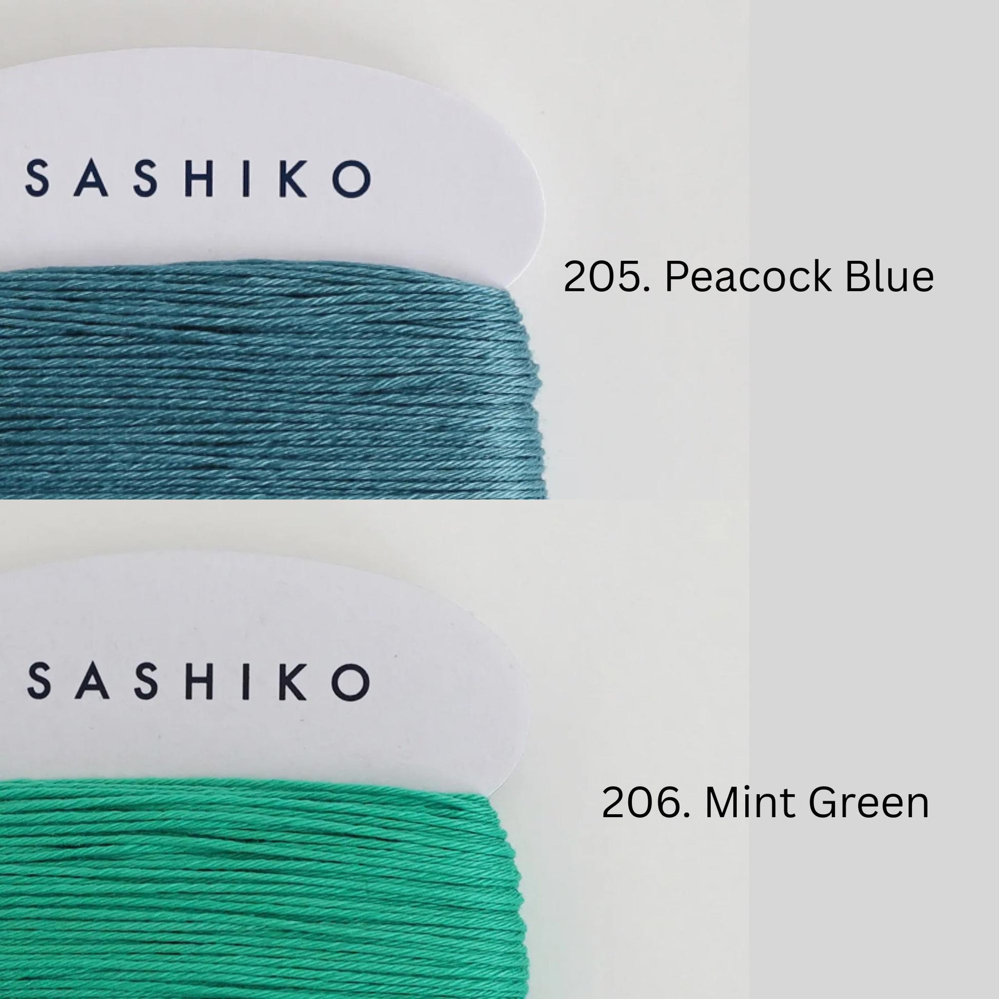two spools of thread, each with a different color: one is green and the other is blue. The text above the spools indicates the color of the thread, with "SASHIKO" on the green thread and "205. Peacock Blue" on the blue thread. The text below the spools indicates the type of thread, with "206. Mint Green" on the green thread and "Mint Green" on the blue thread.
