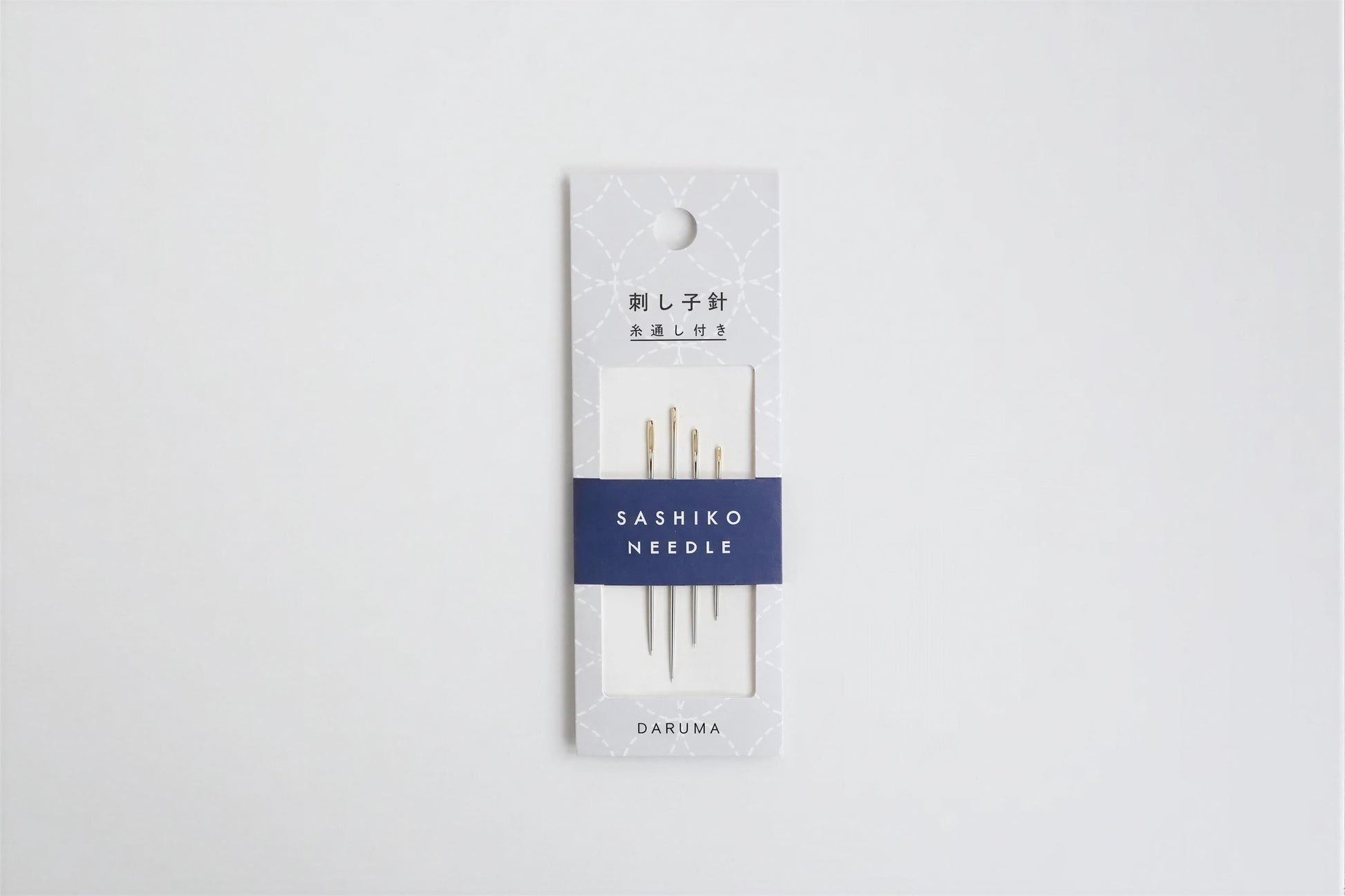 A package of Sashiko needles, with the brand name and product details printed on the packaging.
