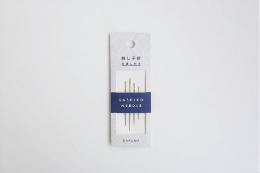 A package of Sashiko needles, with the brand name and product details printed on the packaging.