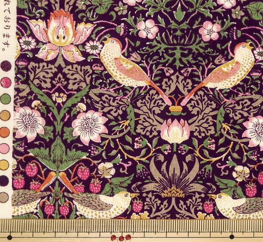 The image is a detailed and intricate fabric pattern featuring a variety of birds, flowers, and berries in shades of pink, green, and purple. The pattern is rich in detail and complexity, showcasing the craftsmanship and artistry of the design.