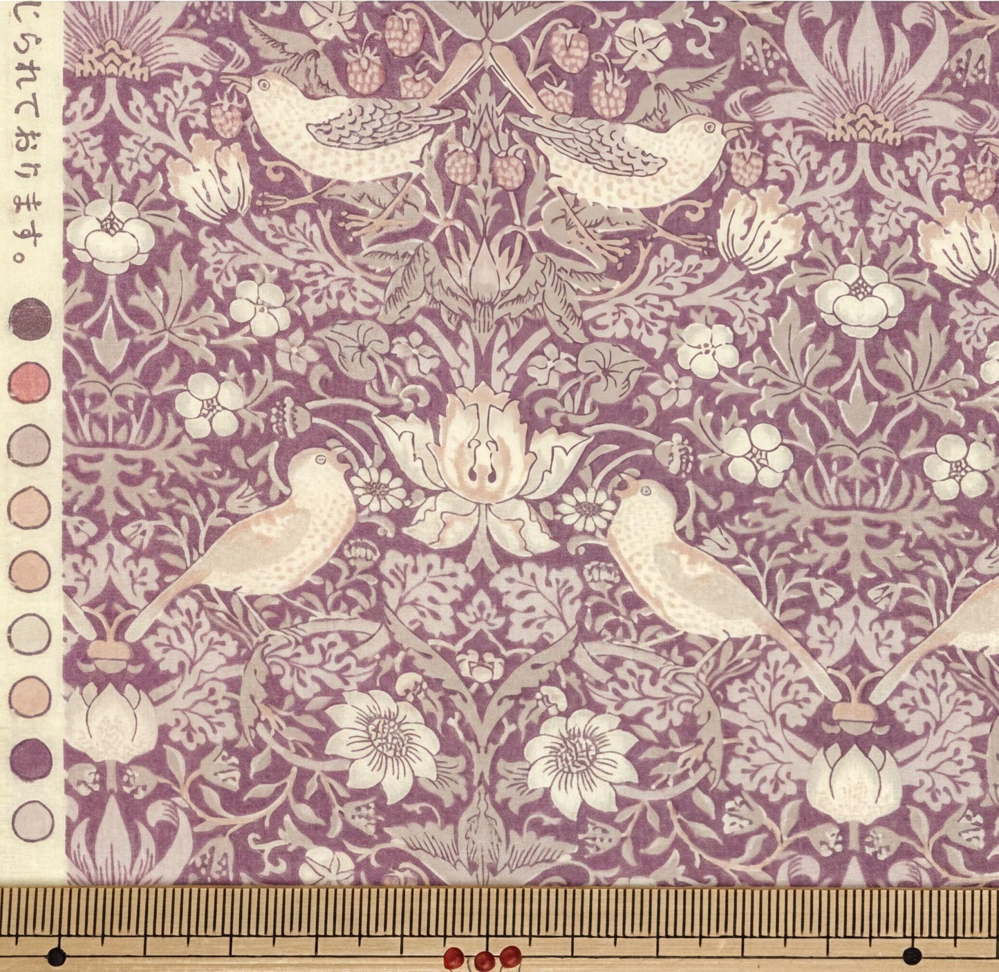 a repeating pattern of birds, flowers, and leaves in shades of purple and pink. The pattern is intricate and detailed, with the birds and flowers arranged in a symmetrical and harmonious manner. The overall design is visually appealing and showcases the artist's skill in capturing the beauty of nature.
