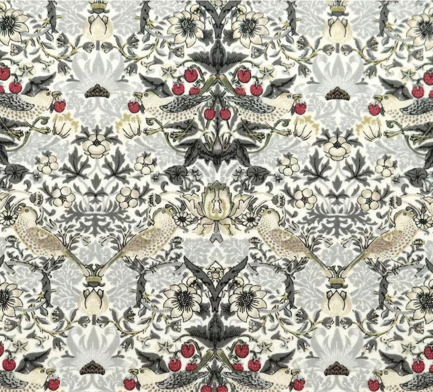 The image is a repeating pattern of birds, flowers, and berries in shades of gray, black, and white.