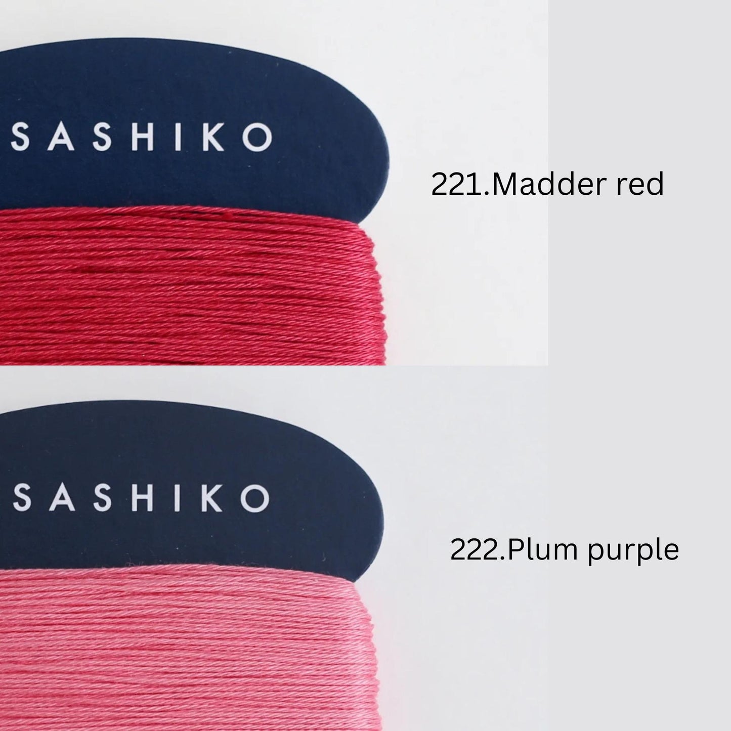 two spools of thread, each with a different color: one is a dark blue color, and the other is a lighter shade of red. The text above the spools indicates the color of the thread, with "SASHIKO" on the dark blue spool and "222.Madder red" on the red spool. The text below the spools indicates the color of the thread, with "222.Plum purple" on the dark blue spool and "222.Plum purple" on the red spool.