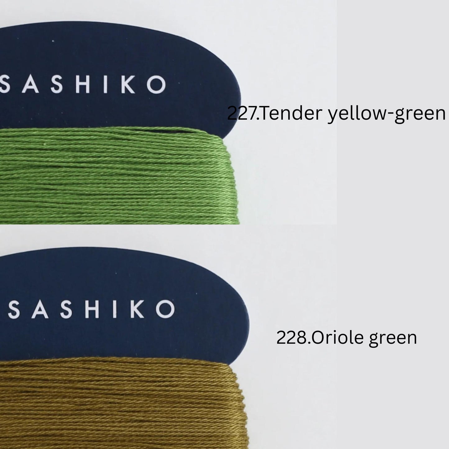 two spools of thread, one with a darker green color and the other with a lighter green color. The spools are labeled with the brand name "SASHIKO" and the thread colors are described as "227.Tender yellow-green" and "228.Oriole green".