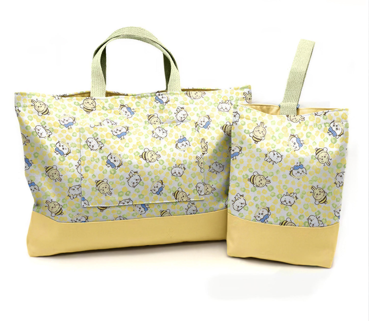 two yellow tote bags with a playful cartoon character print.