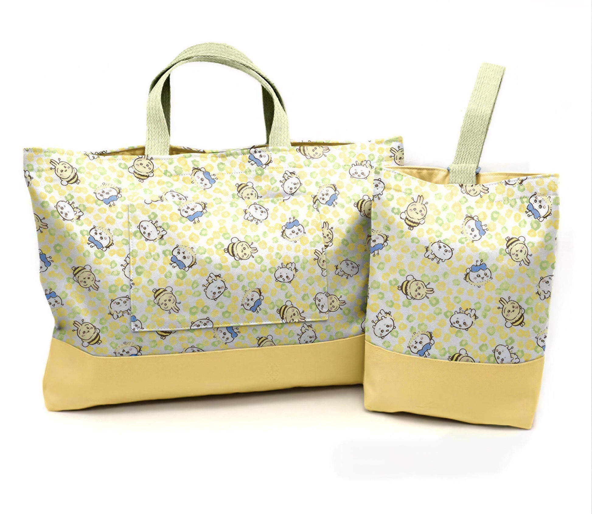 two yellow tote bags with a playful cartoon character print.