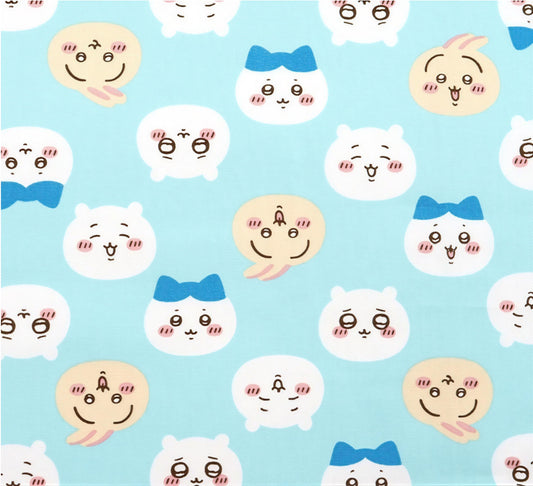 a repeating pattern of cartoon-style faces with exaggerated features, such as large eyes, big noses, and wide smiles, against a light blue background.