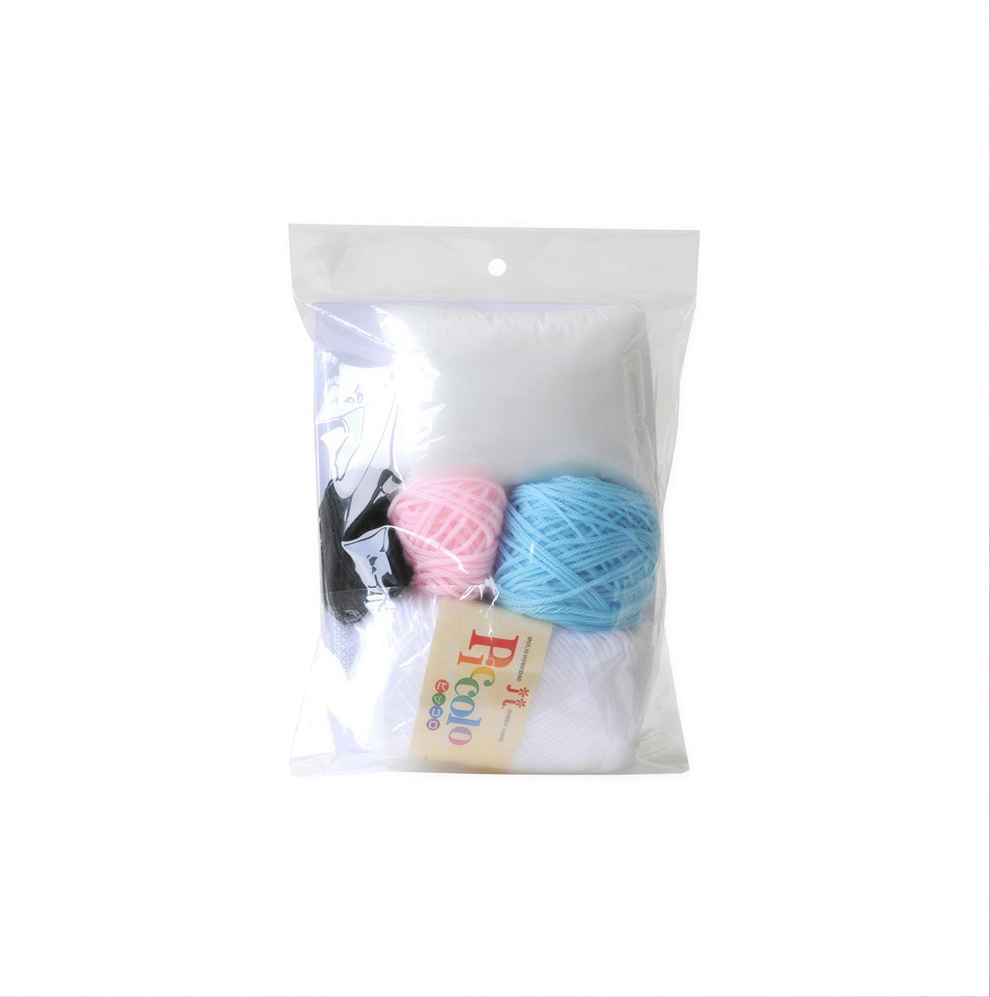 A clear plastic bag containing various colored yarn balls, including blue, pink, and white.