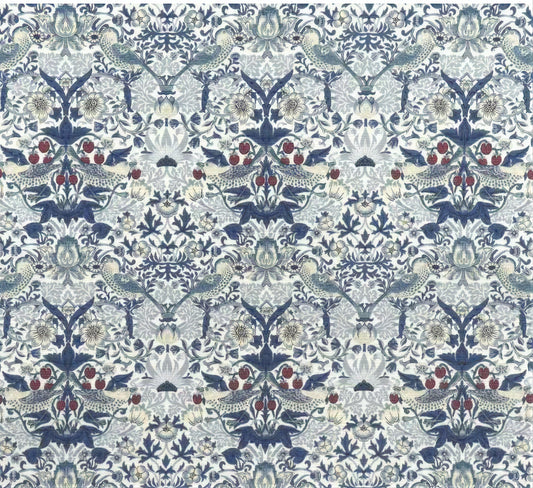 a repeating pattern of blue and white floral designs with red berries and leaves. The pattern is symmetrical and intricate, creating a visually striking and detailed design.
