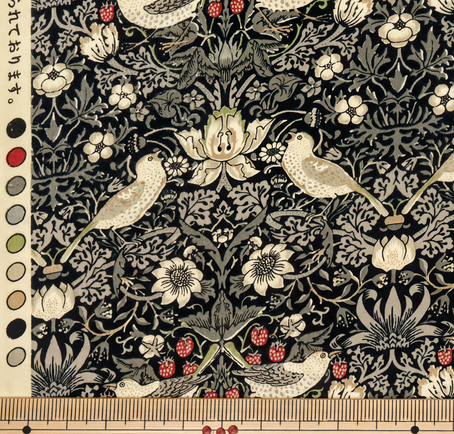 a detailed and intricate floral and bird pattern, with various shades of green, white, and red. The pattern includes flowers, leaves, and birds, creating a visually appealing and harmonious design.