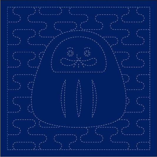 A blue square with a white dotted pattern, featuring a stylized figure or shape in the center.