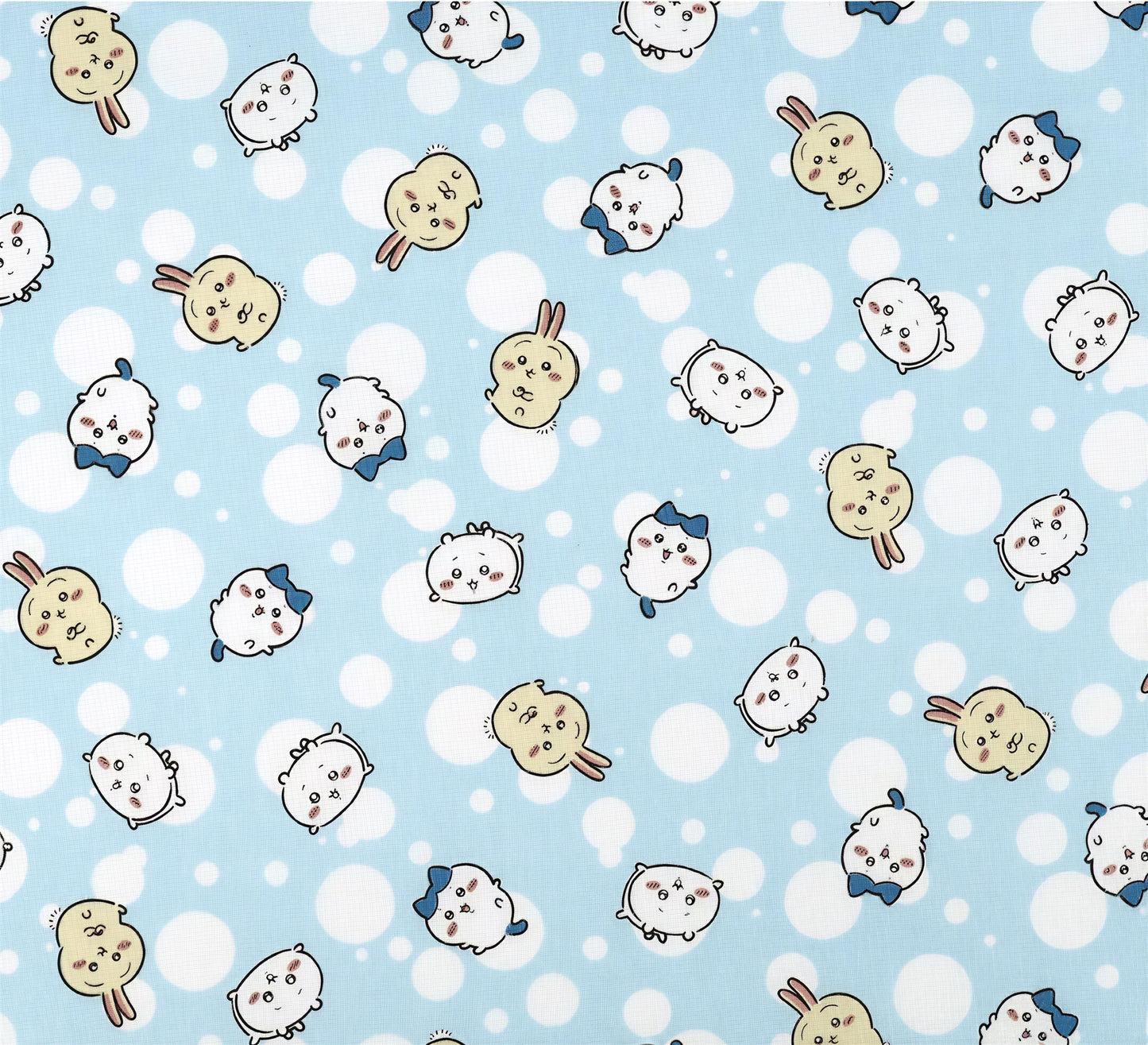 a repeating pattern of various cartoon animal faces, including rabbits, cats, and dogs, against a light blue background with white polka dots.
