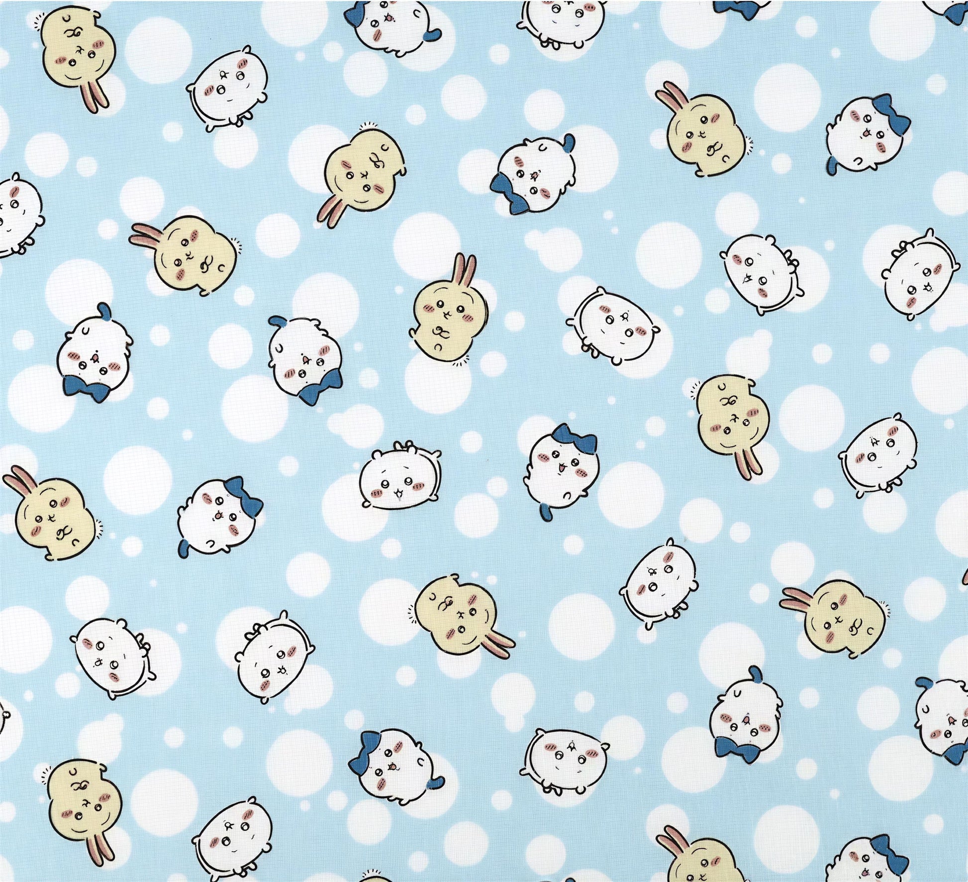 a repeating pattern of various cartoon animal faces, including rabbits, cats, and dogs, against a light blue background with white polka dots.