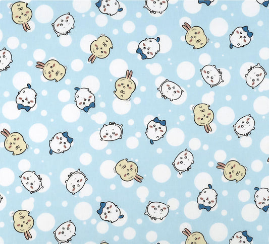 a repeating pattern of various cartoon animal faces, including rabbits, cats, and dogs, against a light blue background with white polka dots.