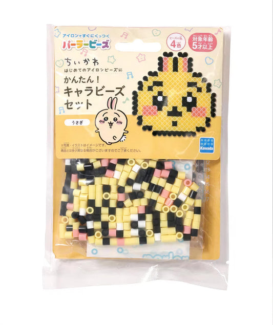 A package of colorful beads in the shape of a cartoon character, likely a pixel art style design.