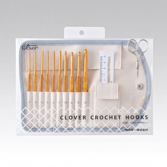 A package containing a set of crochet hooks and a ruler, with the brand name 'CLOVER CROCHET HOOKS' printed on the package.