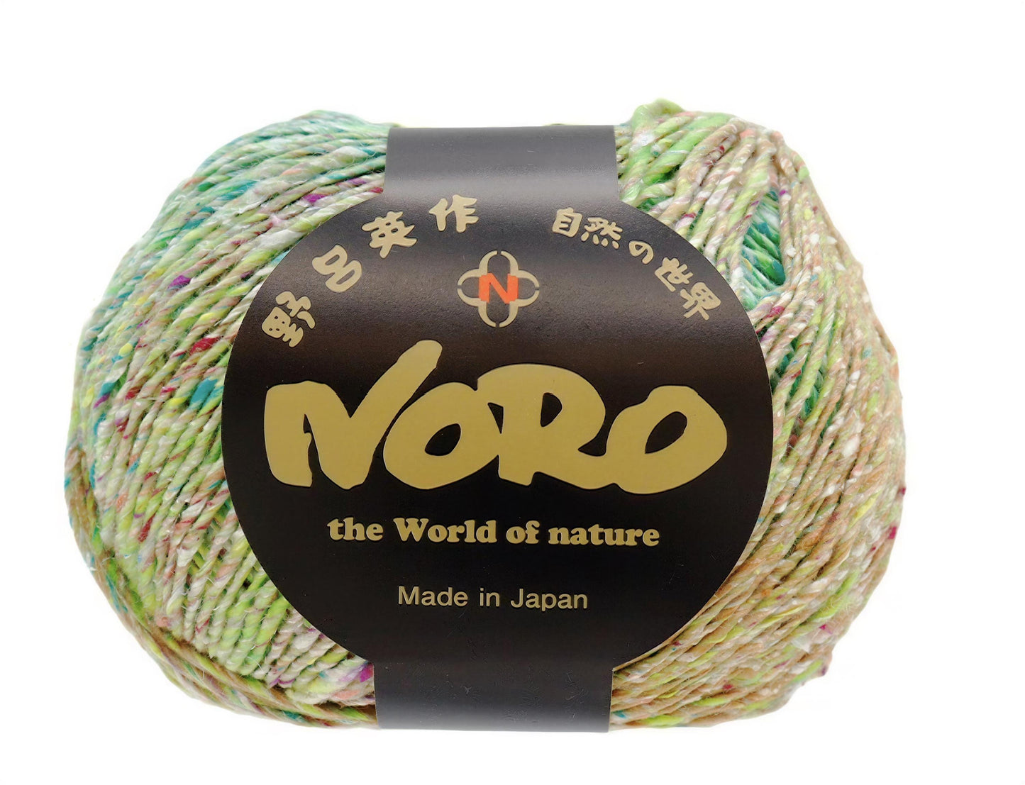 A ball of multicolored yarn with a black and gold label that reads "NERO the World of nature Made in Japan".