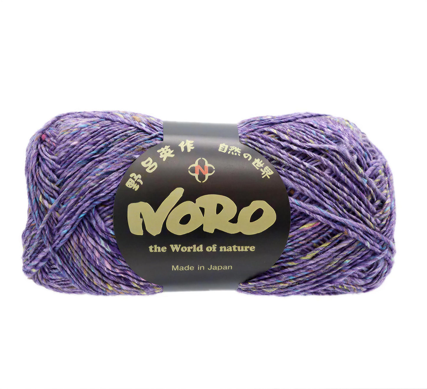 A ball of purple yarn with a label that reads "NERO the World of nature Made in Japan".
