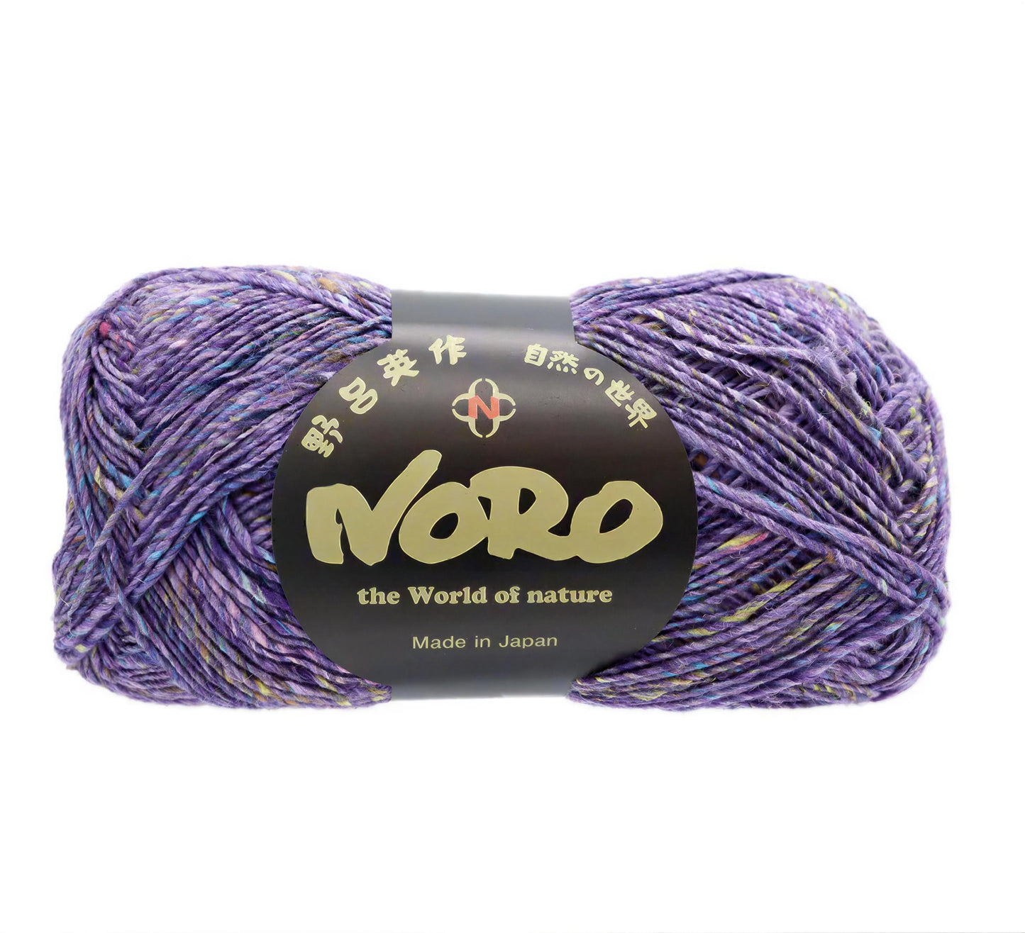 A ball of purple yarn with a label that reads "NERO the World of nature Made in Japan".