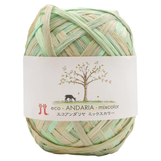 A ball of yarn with a label that includes a tree illustration and text in multiple languages.