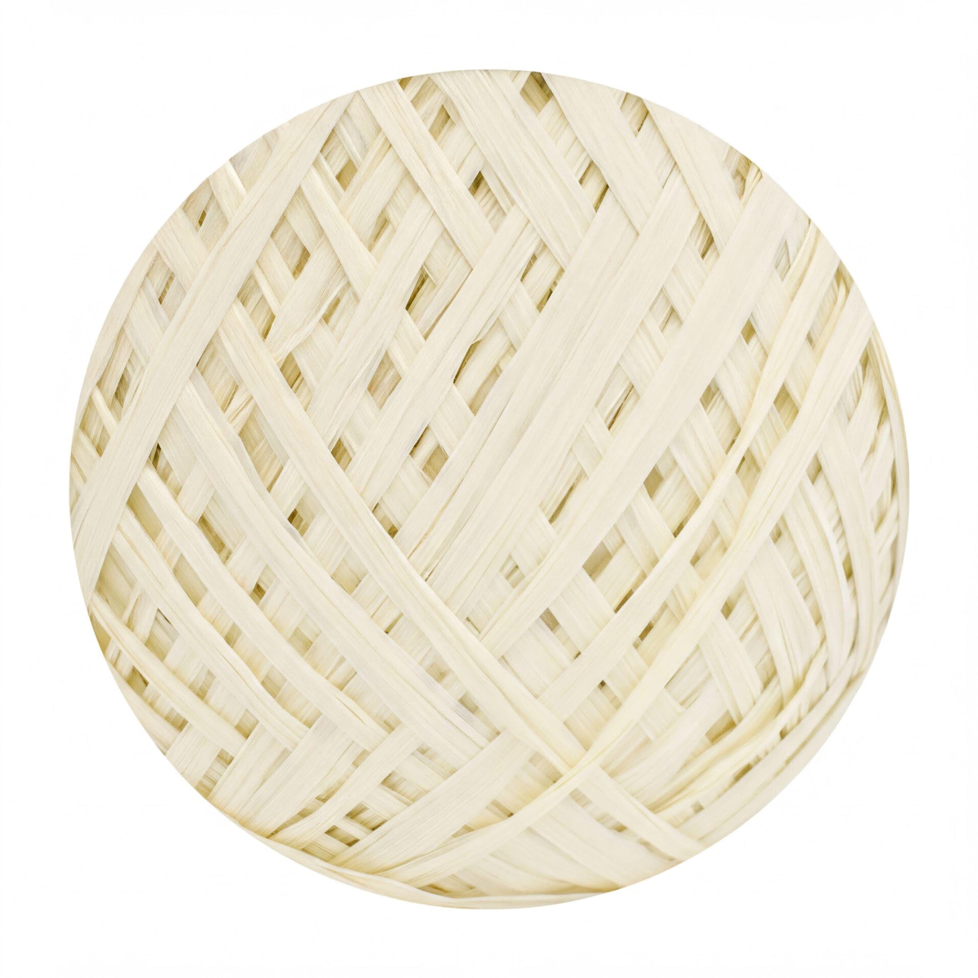 A close-up view of a white, woven ball with a complex, intricate pattern of lines and interlaced strands.