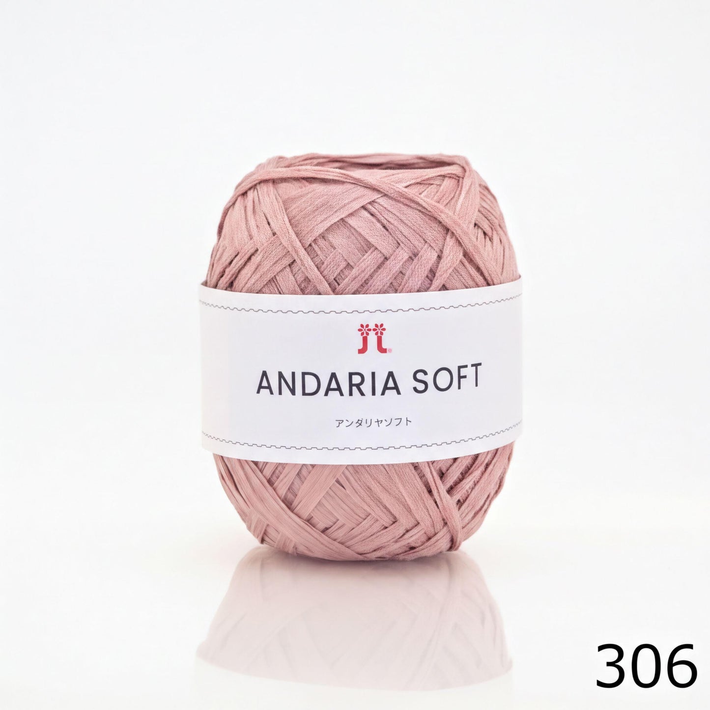A ball of pink yarn labeled "ANDARIA SOFT" with Japanese text, and a number "306" in the bottom right corner.