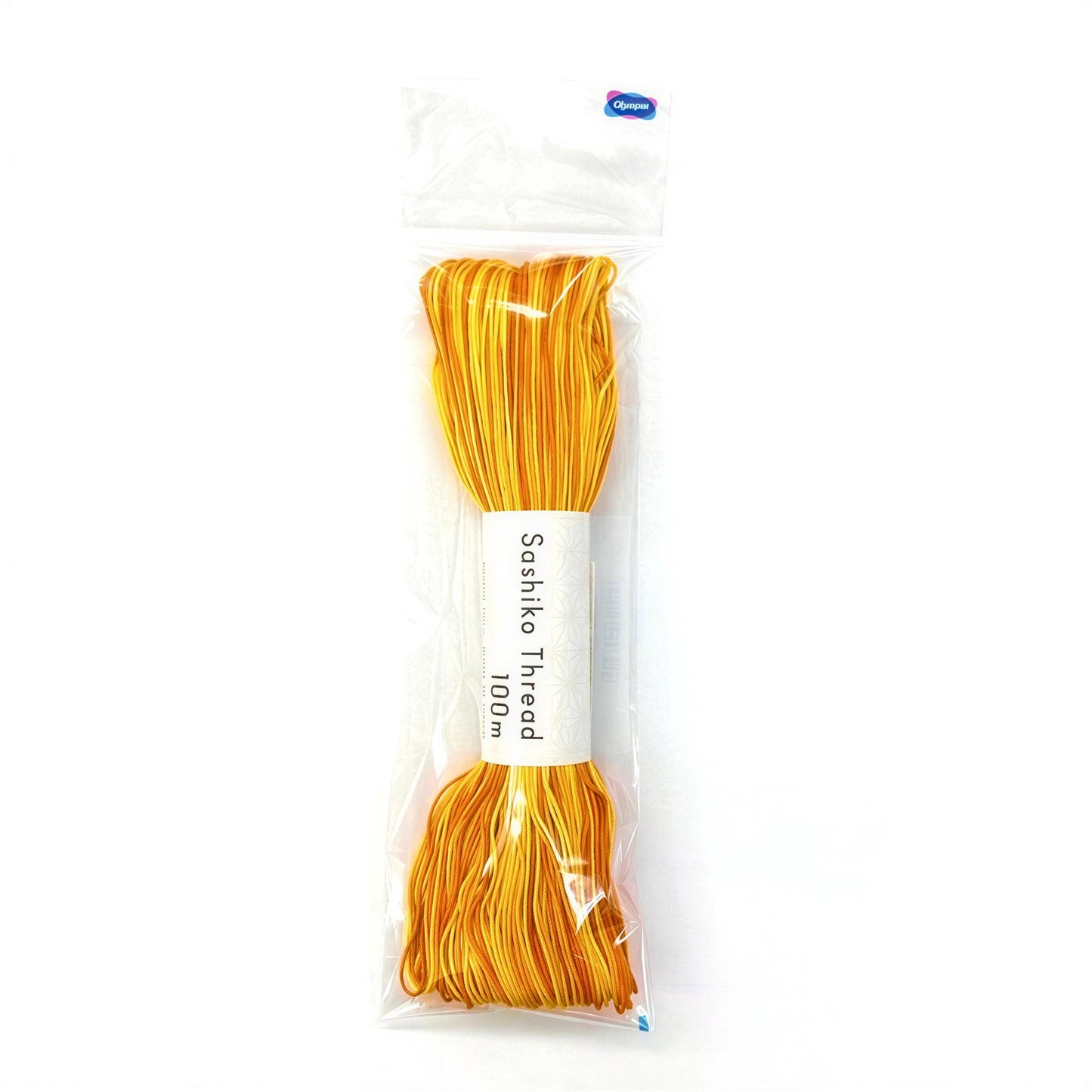 A package of yellow and orange thread, labeled as "Sashiko Thread 100m".