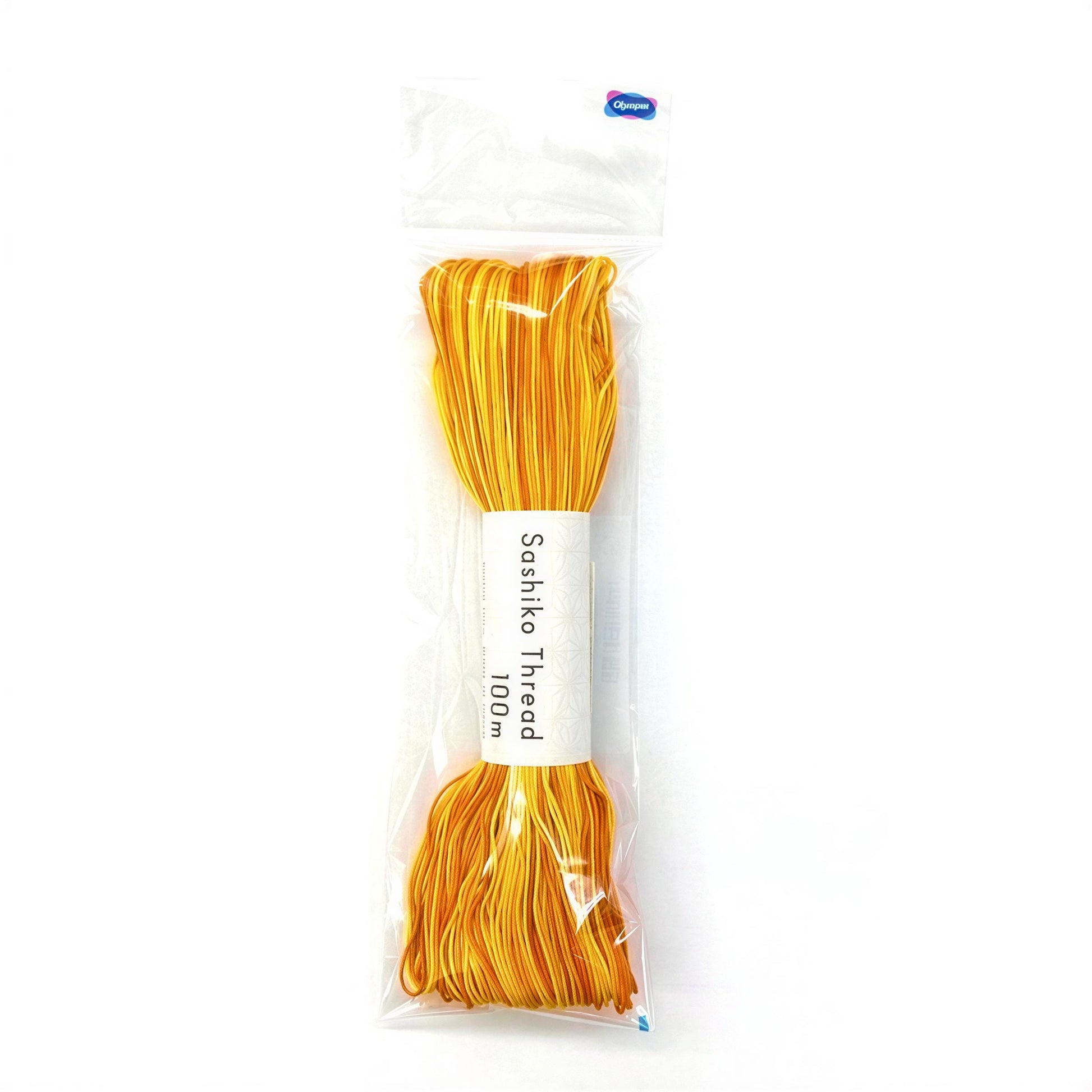 A package of yellow and orange thread, labeled as "Sashiko Thread 100m".