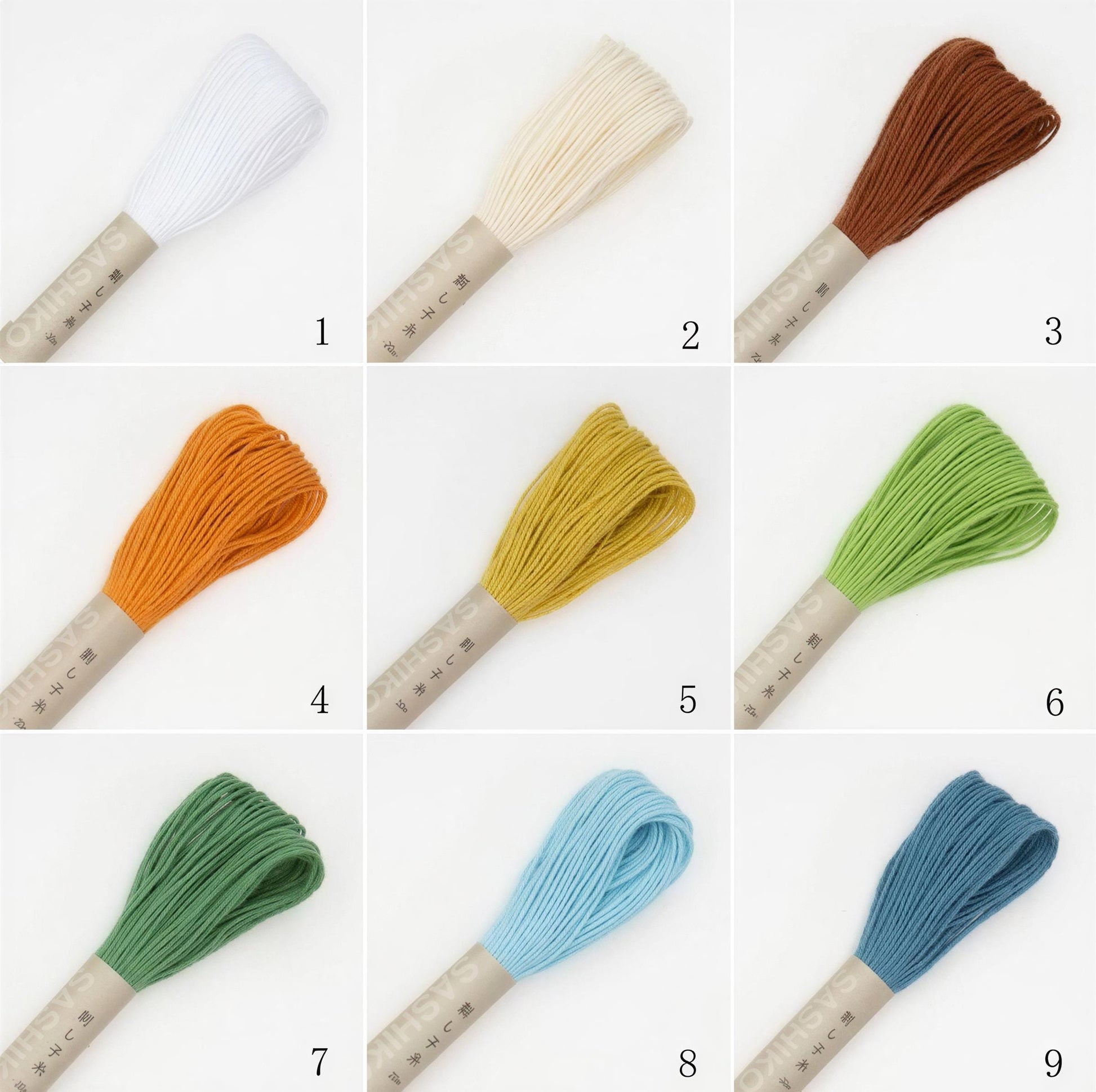 nine different spools of thread, each with a unique color and size, arranged in a 3x3 grid.