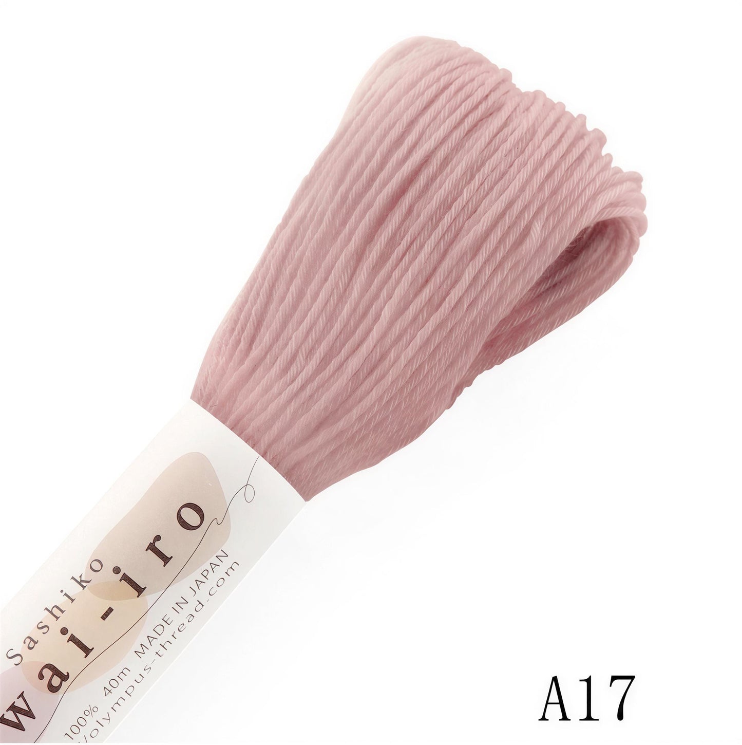 A close-up image of a skein of pink thread, with a label indicating it is made in Japan and has a weight of 40g.
