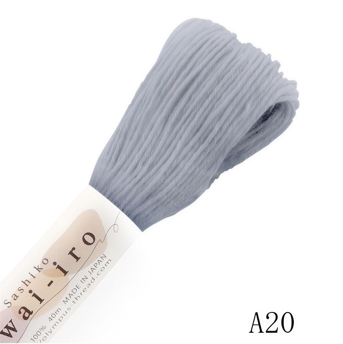 a skein of grey thread, labeled as "A20" and "Sashiro", with a label indicating it is made in Japan and has a weight of 40g.